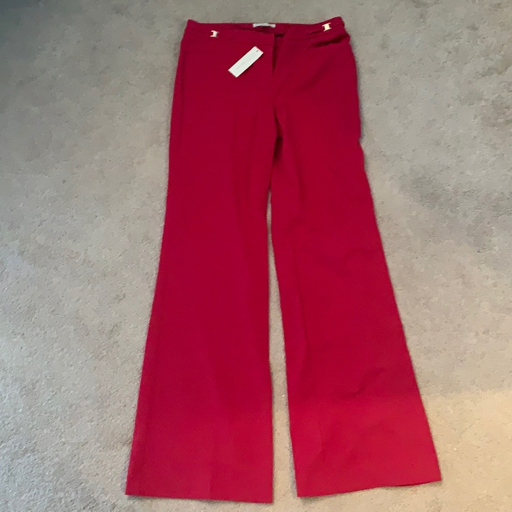 Reddish pink dress pants.